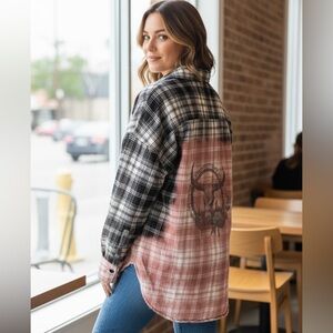 Upcycled bleached shacket with western skull sublimation.